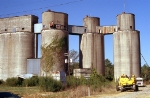 Abandoned grain plant by the crossing